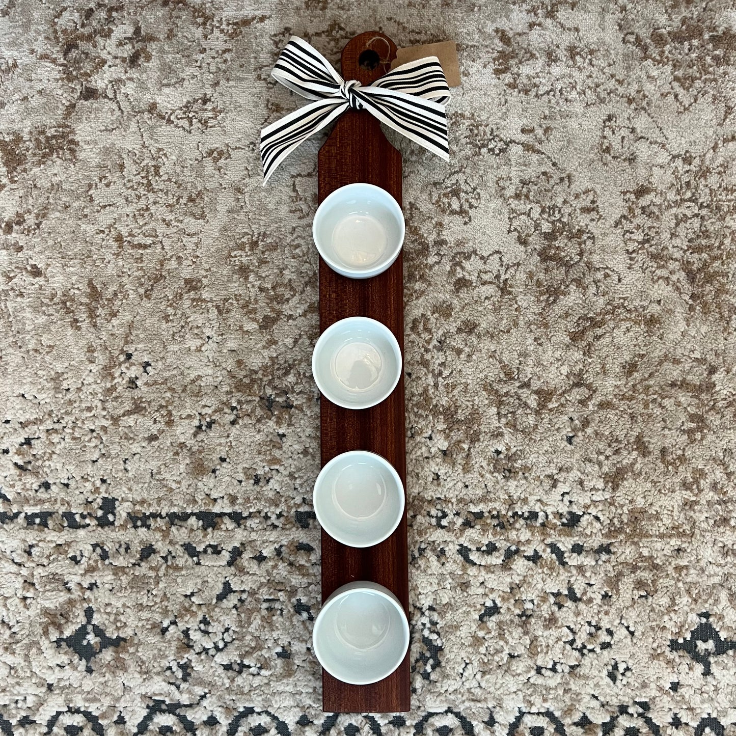 Handcrafted sapele wood flight board, 24 inches long, featuring 4 mini cup bowls—ideal for dips, sauces, or tasting flights.