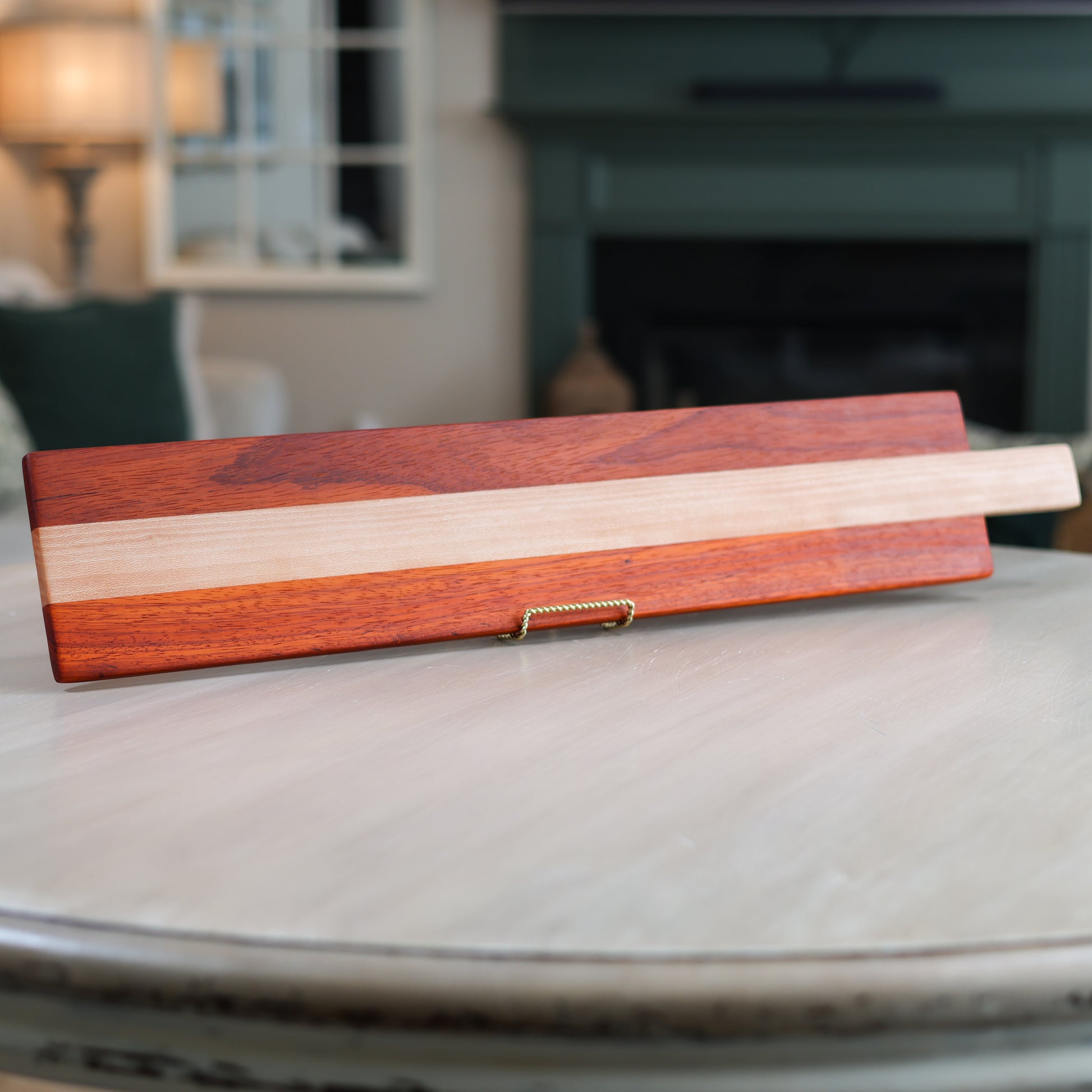 Wooden charcuterie board in a living room
