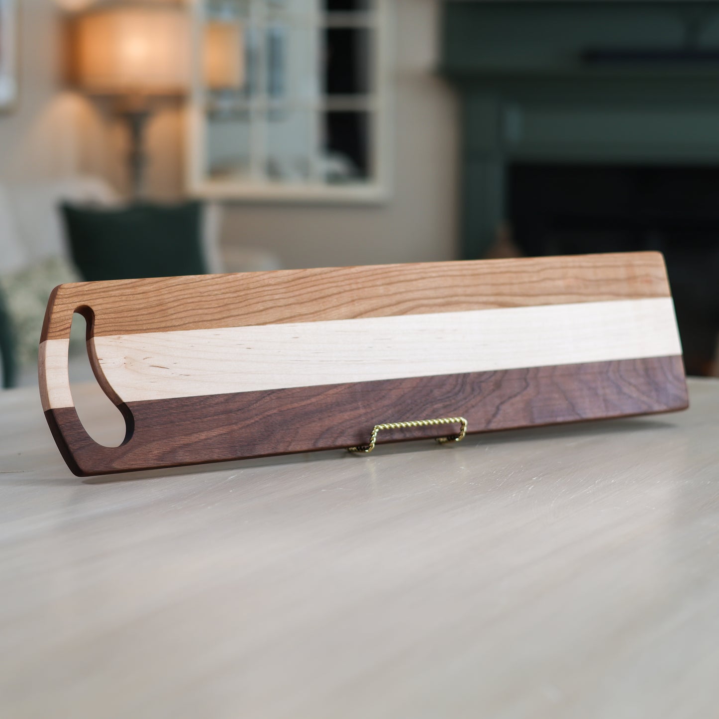 Wooden cutting board with a handle in a living room