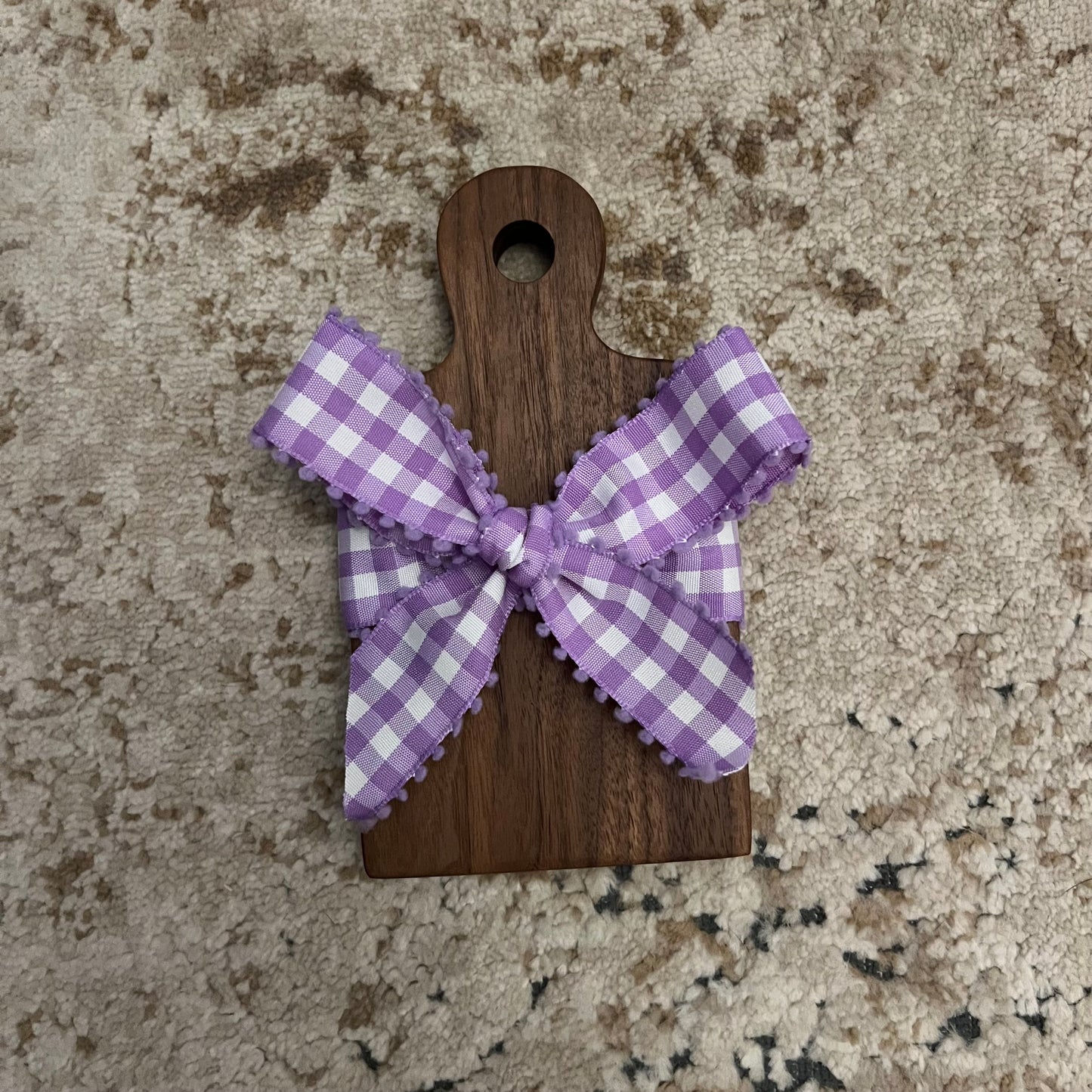 7" x 4" handcrafted mini walnut coaster board with natural wood grain