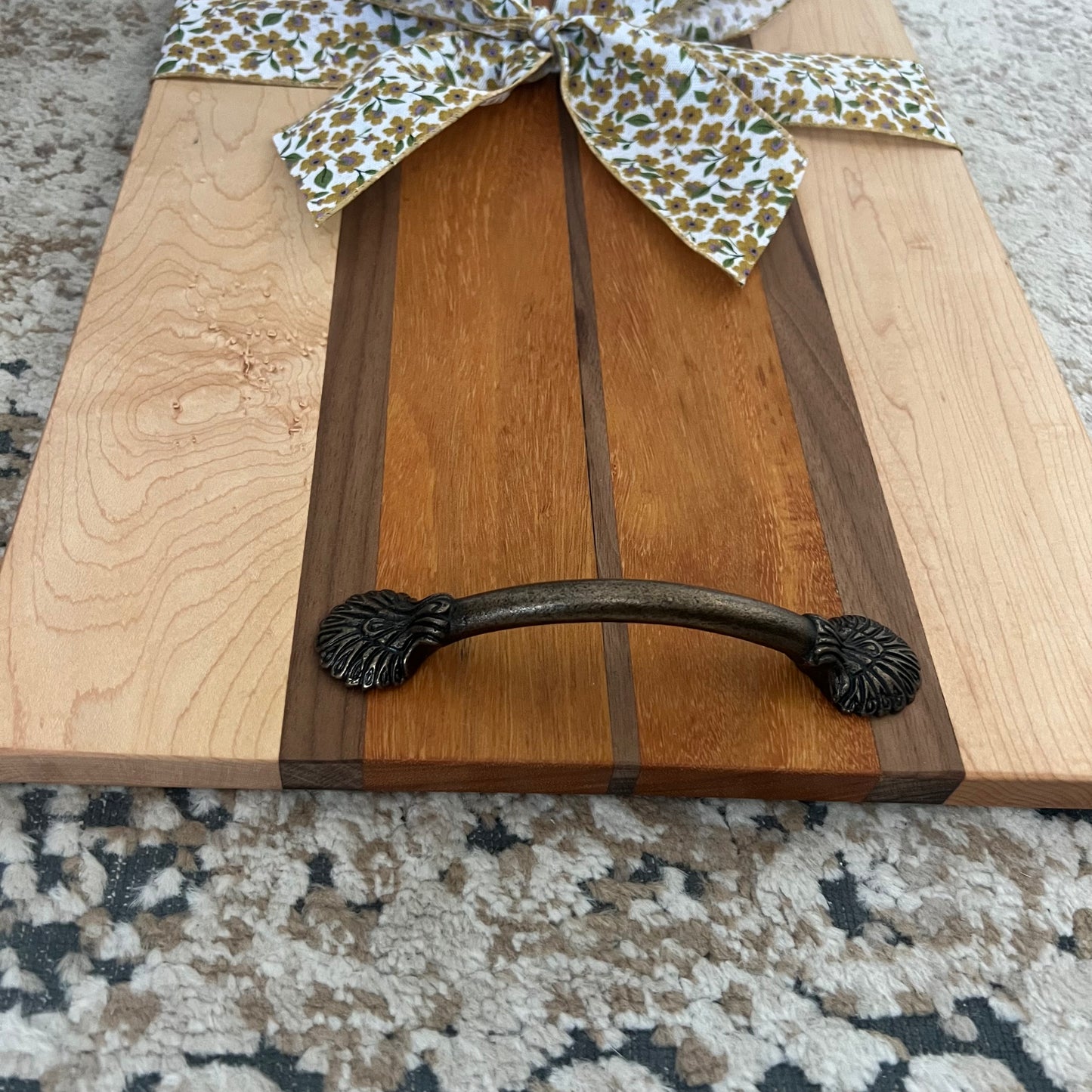 Serving tray made from canary, maple, and walnut wood with handles, approximately 22 by 10.5 inches, handcrafted with warm contrast and smooth finish.