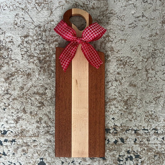 Merbau and cherry wood bread board, handcrafted and measuring 17.5 x 6 inches with a smooth finish and rich wood grain.