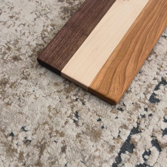 Handcrafted Walnut, Maple & Cherry Charcuterie Board – rounded handle